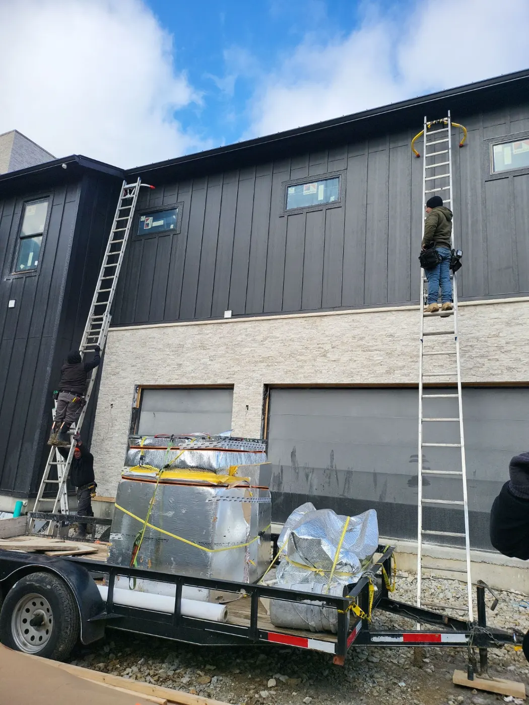 Tarping and dry-in on a Gatewood Lakes commercial roof